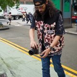 Bella Amity crew member filming on the street